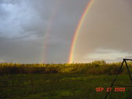 Photo Of A Rainbow Over The Prairie